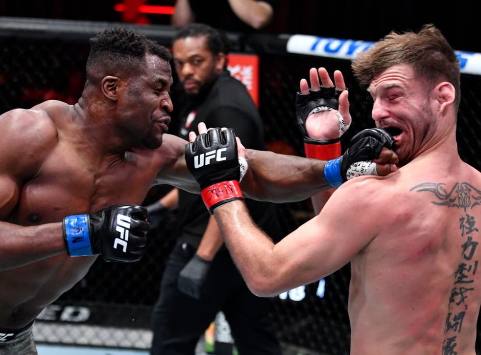 Francis Ngannoou (left) finished Stipe Miocic with a left hook and hammer fist