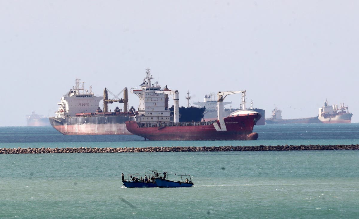 Two more tugboats join effort to free Ever Given stuck in Suez Canal ...