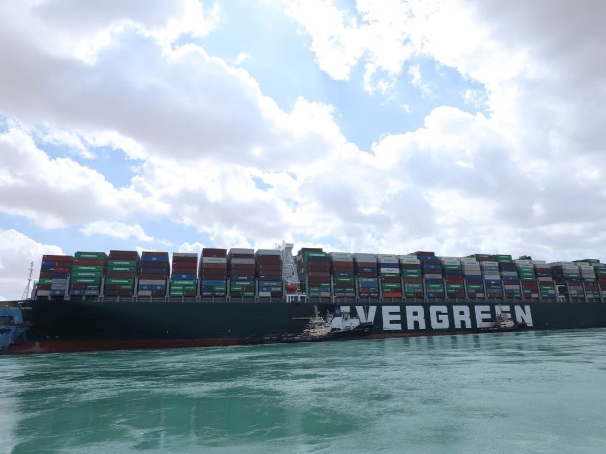 Ever Given: Egyptian president orders operation to lift containers from stricken Suez Canal ship