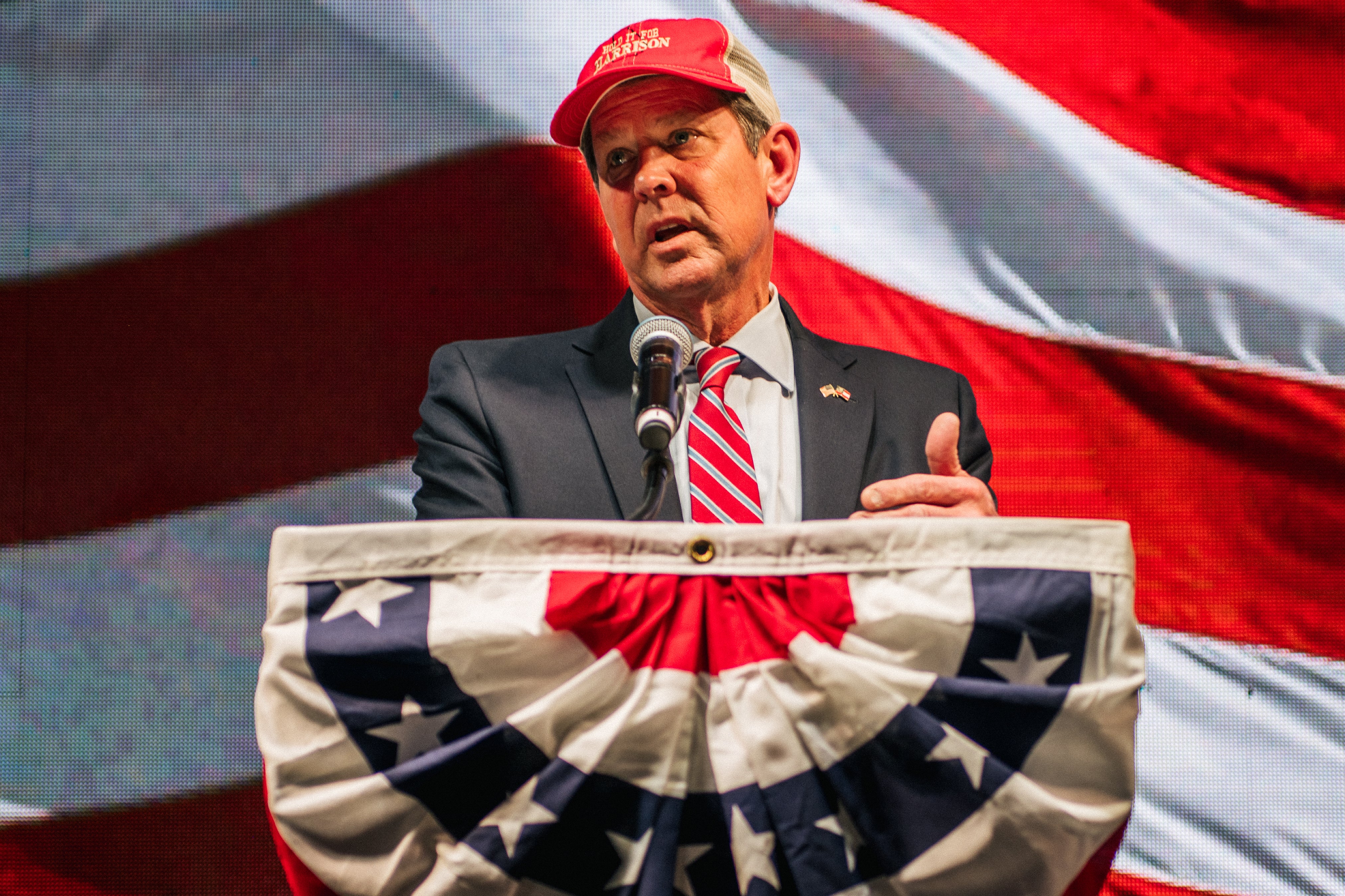 Georgia governor Brian Kemp speaks during a run-off election night party on 5 January in Atlanta, Georgia