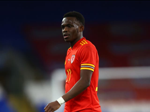 <p>Rabbi Matondo in action for Wales</p>
