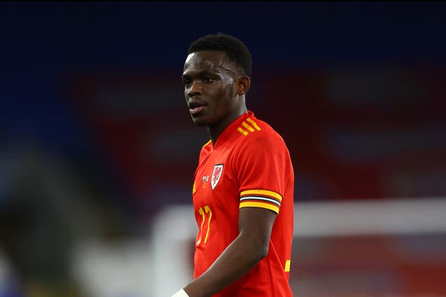 <p>Rabbi Matondo in action for Wales</p>