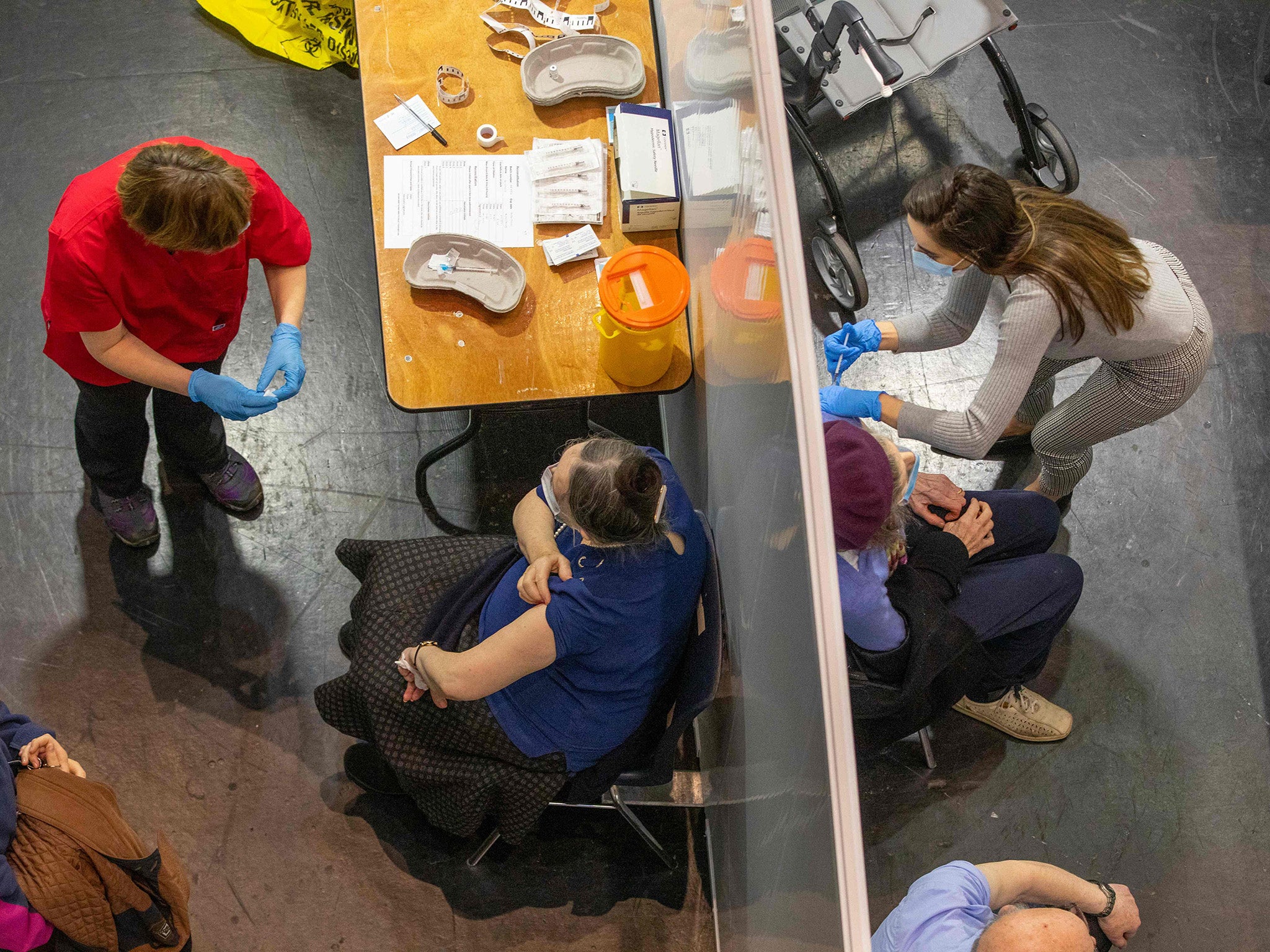 <p>Northern Ireland’s first minister Arlene Foster receives her first Covid vaccination at Castle Park Leisure Centre in Lisnaskea, Co Fermanagh, on Saturday</p>