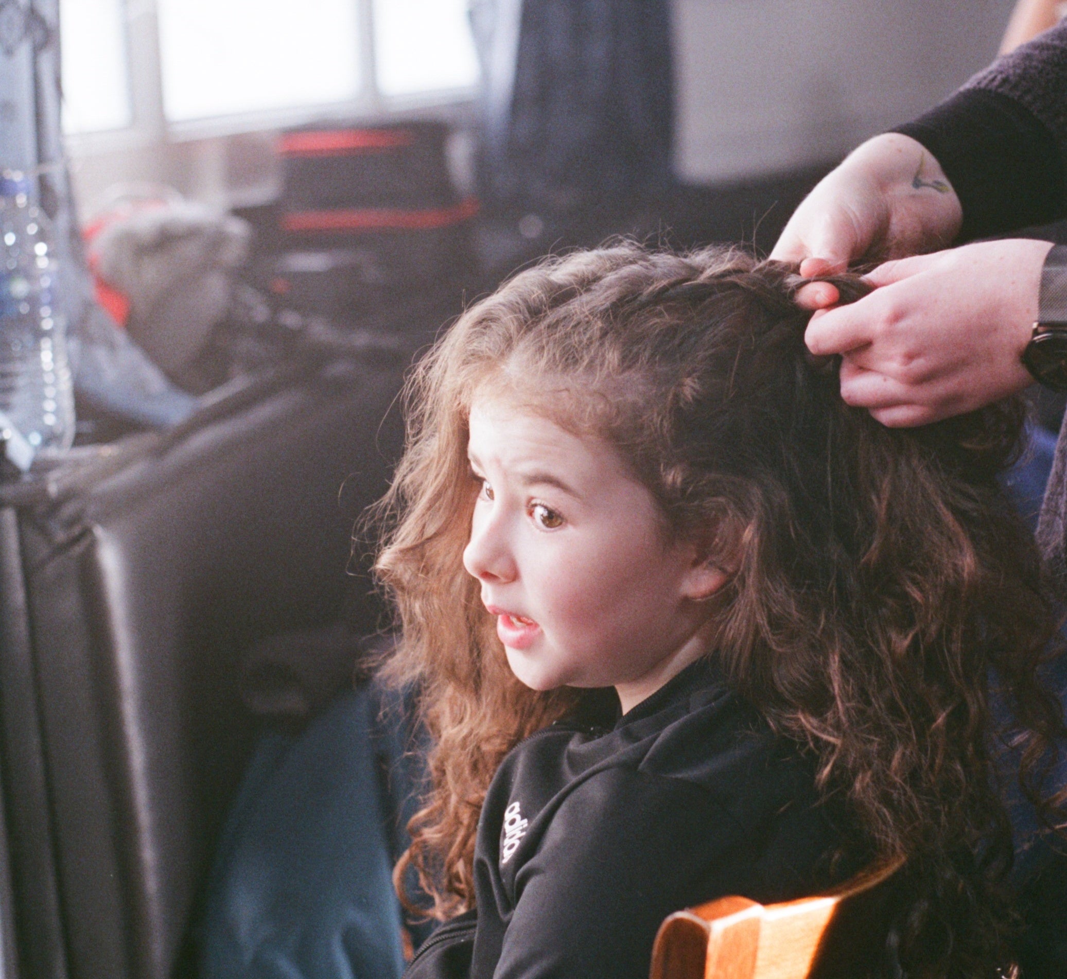 Barrie’s daughter Gracie getting her hair done before a scene