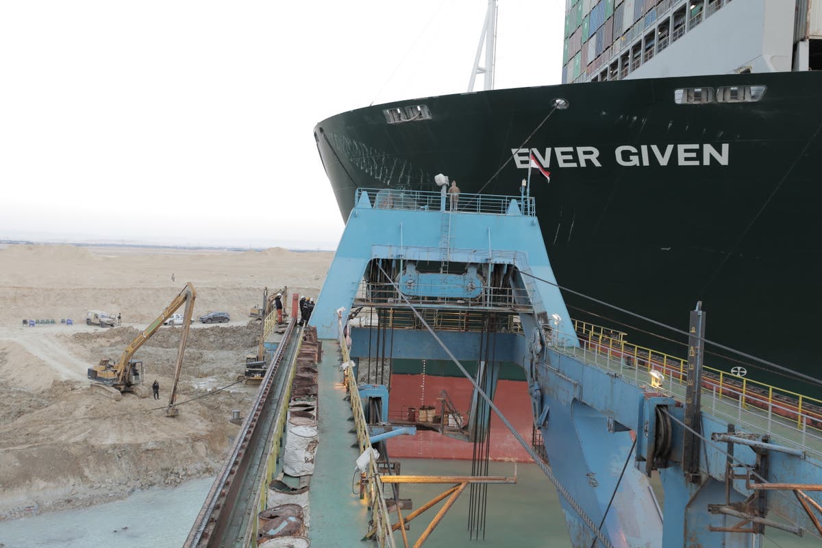 Suez Canal crisis &ndash; live: Ever Given ship &lsquo;partially refloated&rsquo; at high tide but still stuck sideways