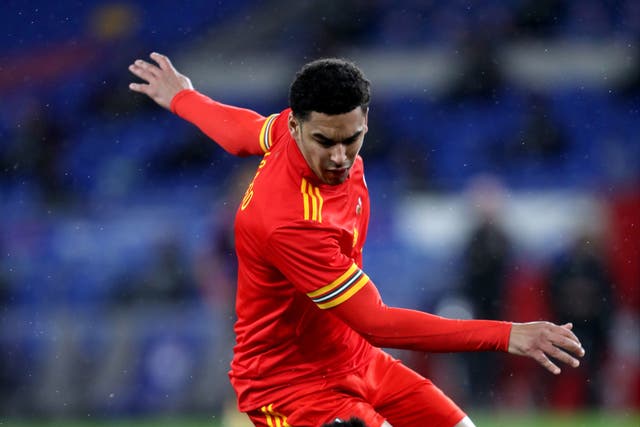 Wales’ Ben Cabango battles for the ball during an international friendly at Cardiff City Stadium