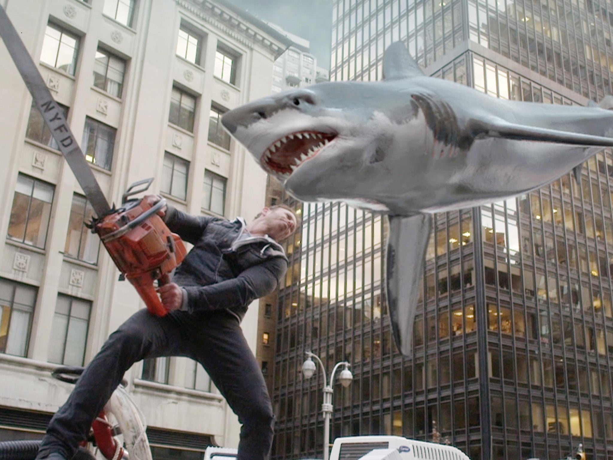 A scene from ‘Sharknado 2’, the film where sharks rain down from the sky
