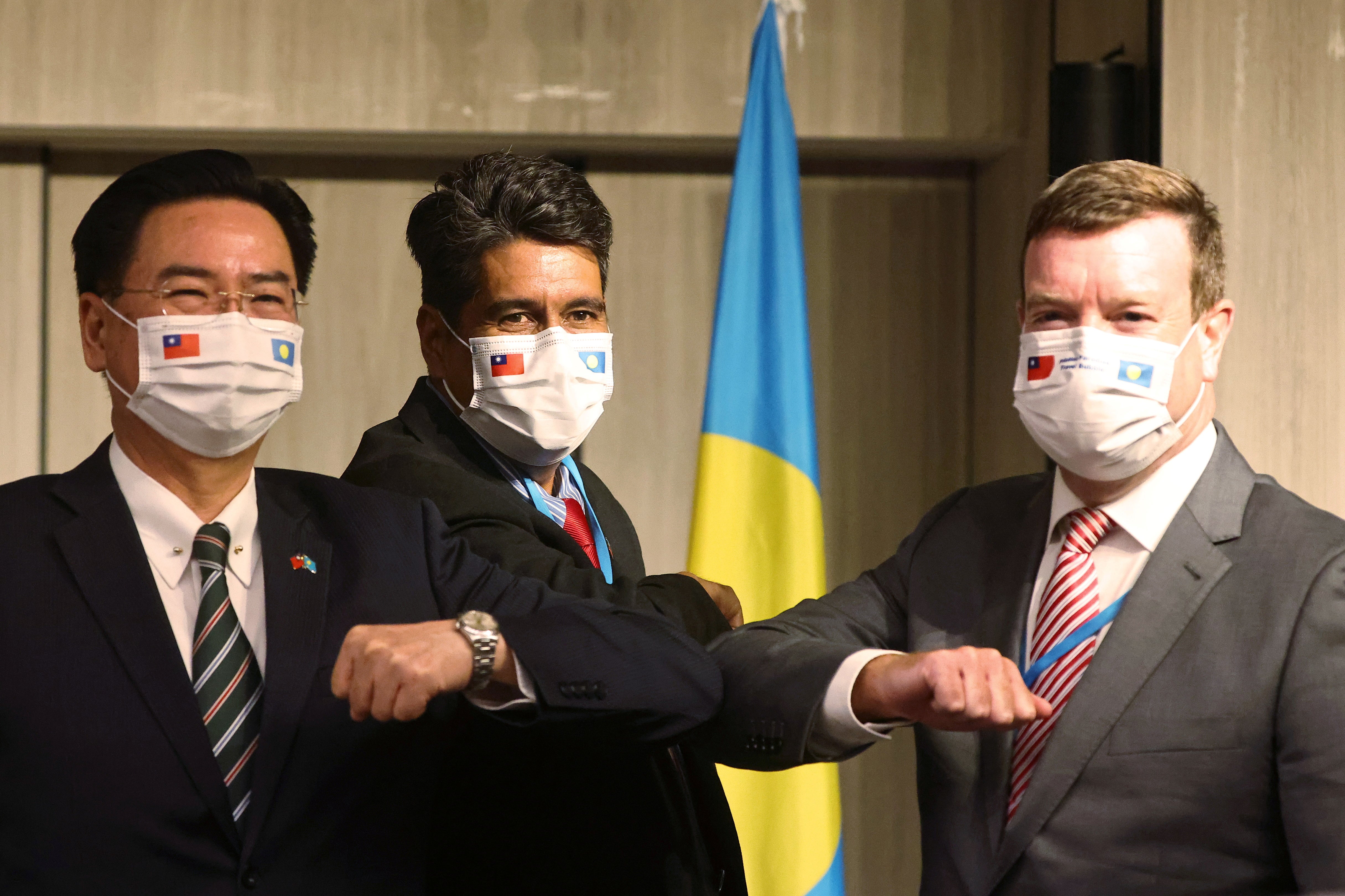 <p>Palau President Surangel Whipps, Taiwan foreign minister Joseph Wu and US Ambassador to Palau John Hennessey-Niland attend a news conference in Taipei, Taiwan on 29 March, 2021</p>
