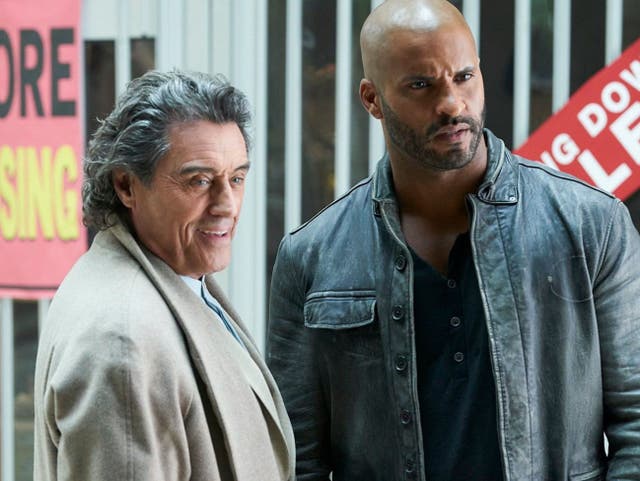 Ian McShane and Ricky Whittle in American Gods