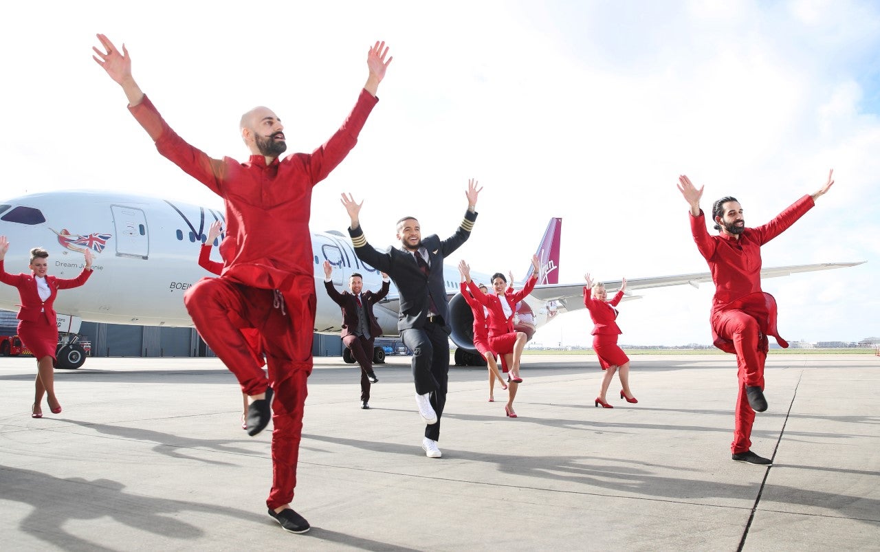 <p>File image: Aston Merrygold joins Bounce Bhangra brothers during a special Virgin Atlantic bhangra class</p>
