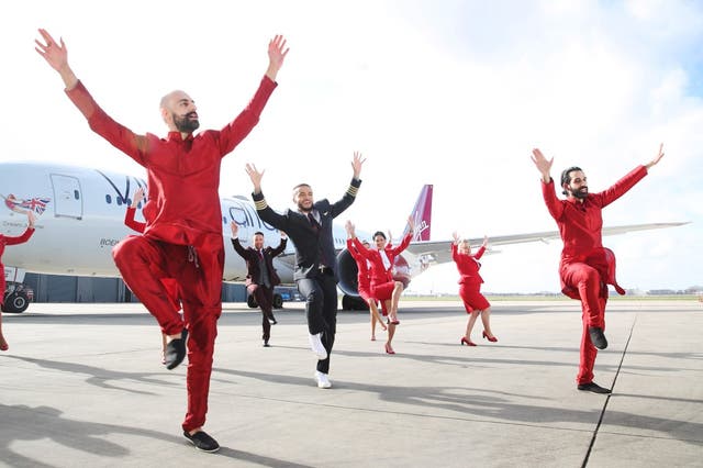 <p>File image: Aston Merrygold joins Bounce Bhangra brothers during a special Virgin Atlantic bhangra class</p>