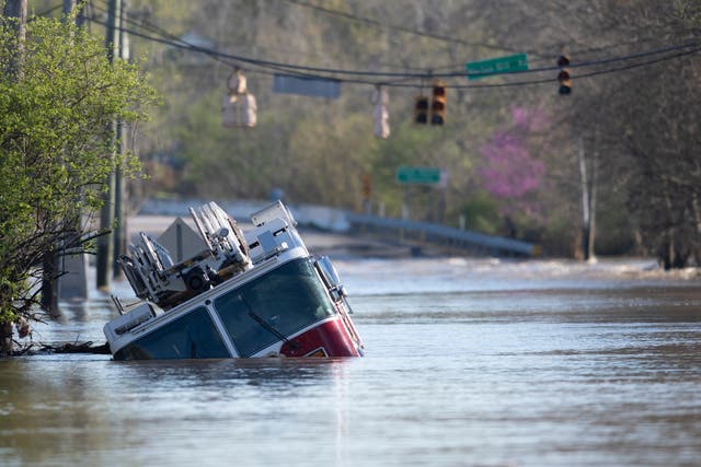 <p>A Nashville Fire Department truck is revealed as flood waters from the Harpeth River recede Monday, 29 March, 2021</p>
