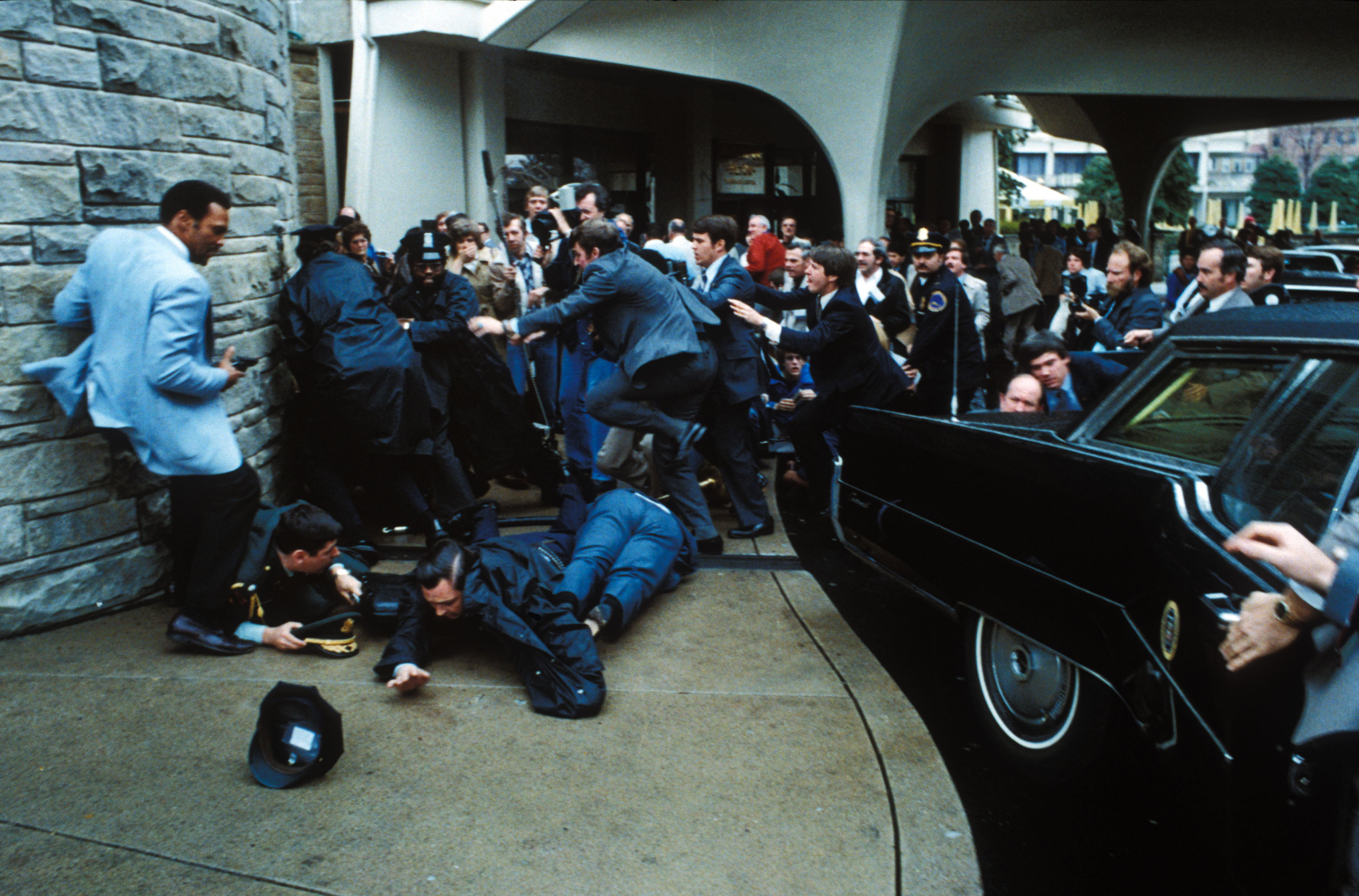 John Hinckley Jr is tackled to the ground by Secret Service agents after attempting to assassinate Ronald Reagan