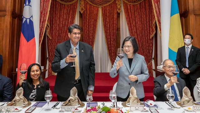 <p>In this photo released by the Taiwan Presidential Office, Palau President Surangel Whipps, center left, toasts with Taiwan President Tsai Ing-wen during a banquet in Taipei, Taiwan on Tuesday, 30 March 2021</p>