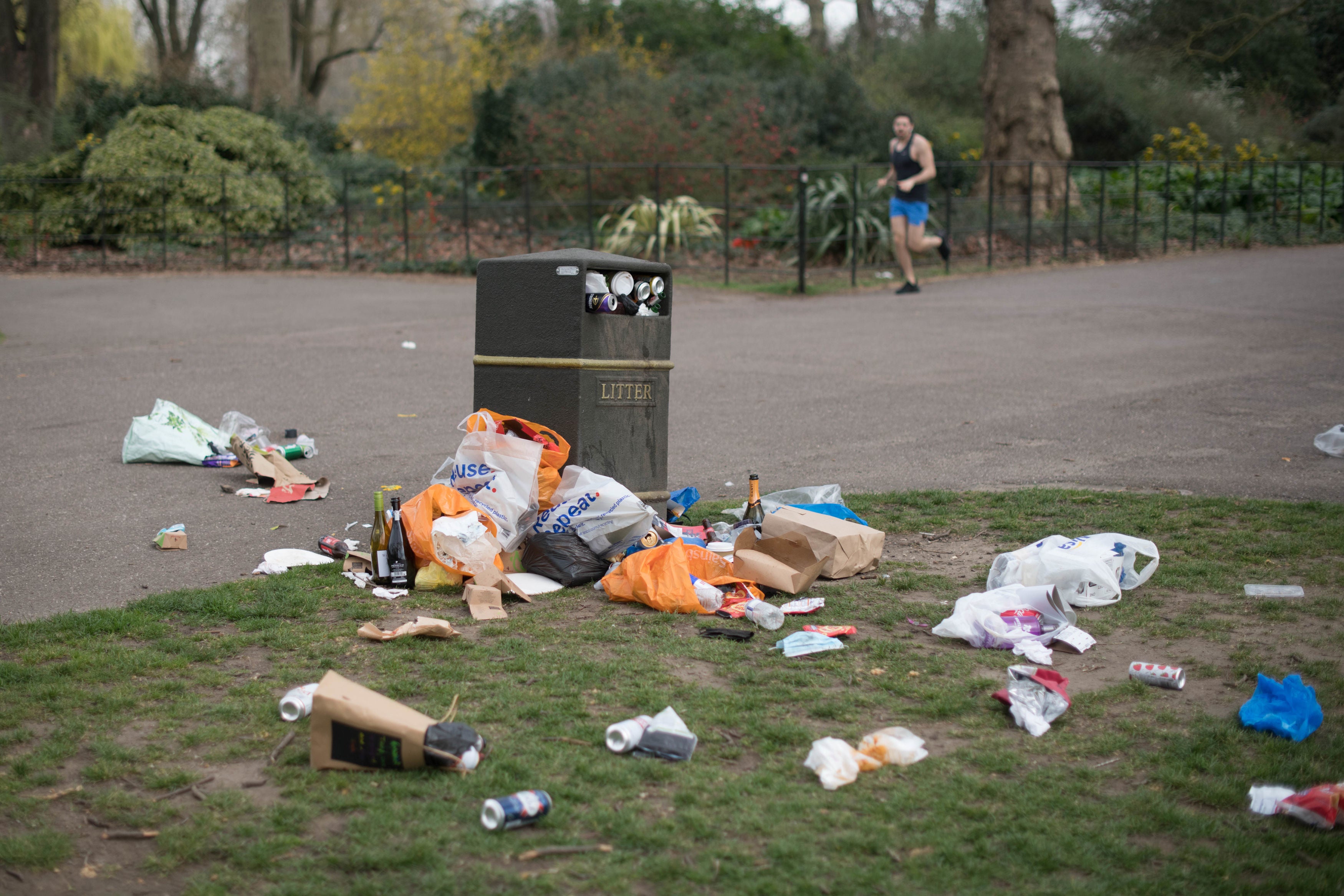 Bins overflow with rubbish in London’s Battersea Park on Wednesday morning