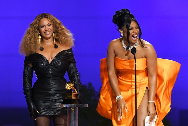 Beyoncé and Megan Thee Stallion accept the Best Rap Performance award at the 2021 Grammys
