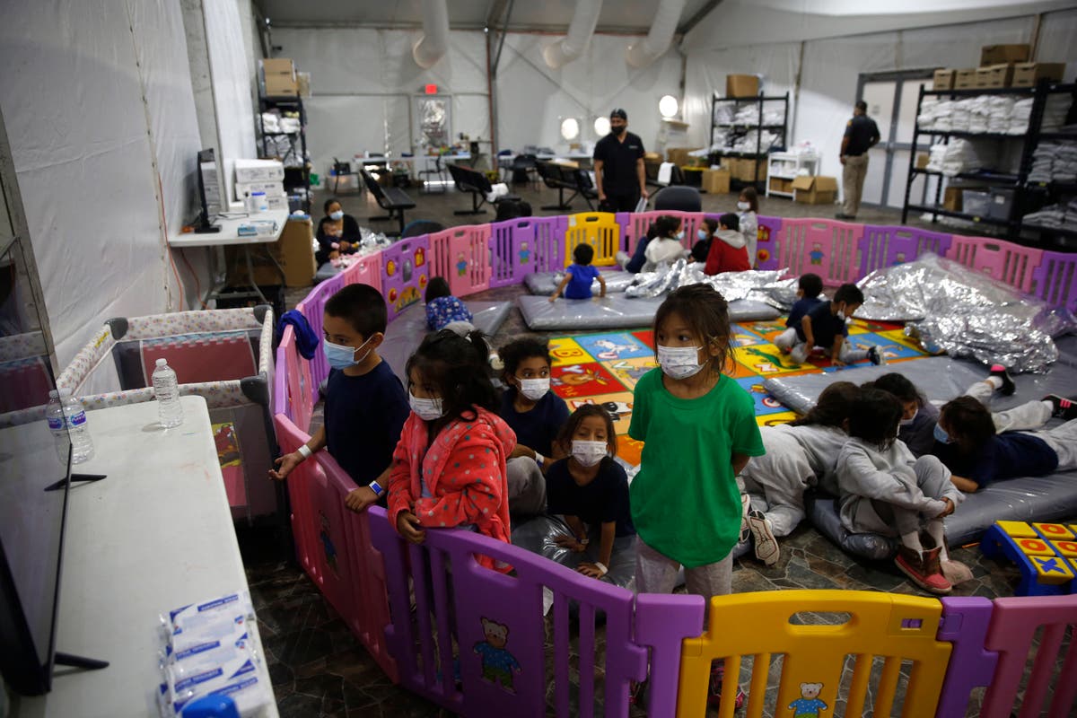 New photos shows migrant children crowded into single playpen at US-Mexico border