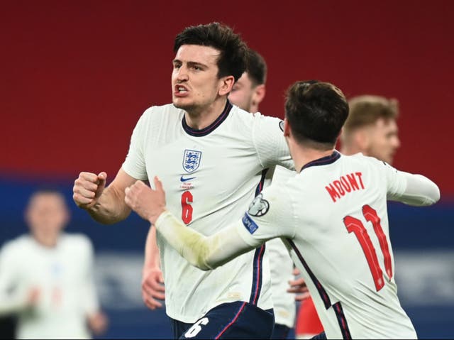 <p>Harry Maguire celebrates scoring England’s late winner</p>