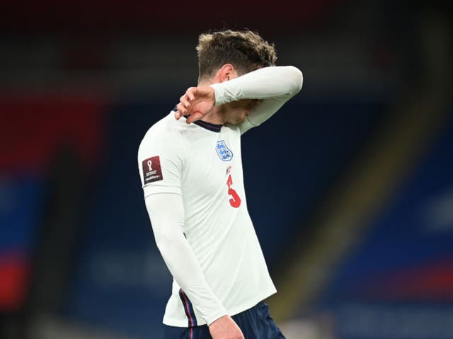 <p>John Stones reacts to his costly error against Poland</p>