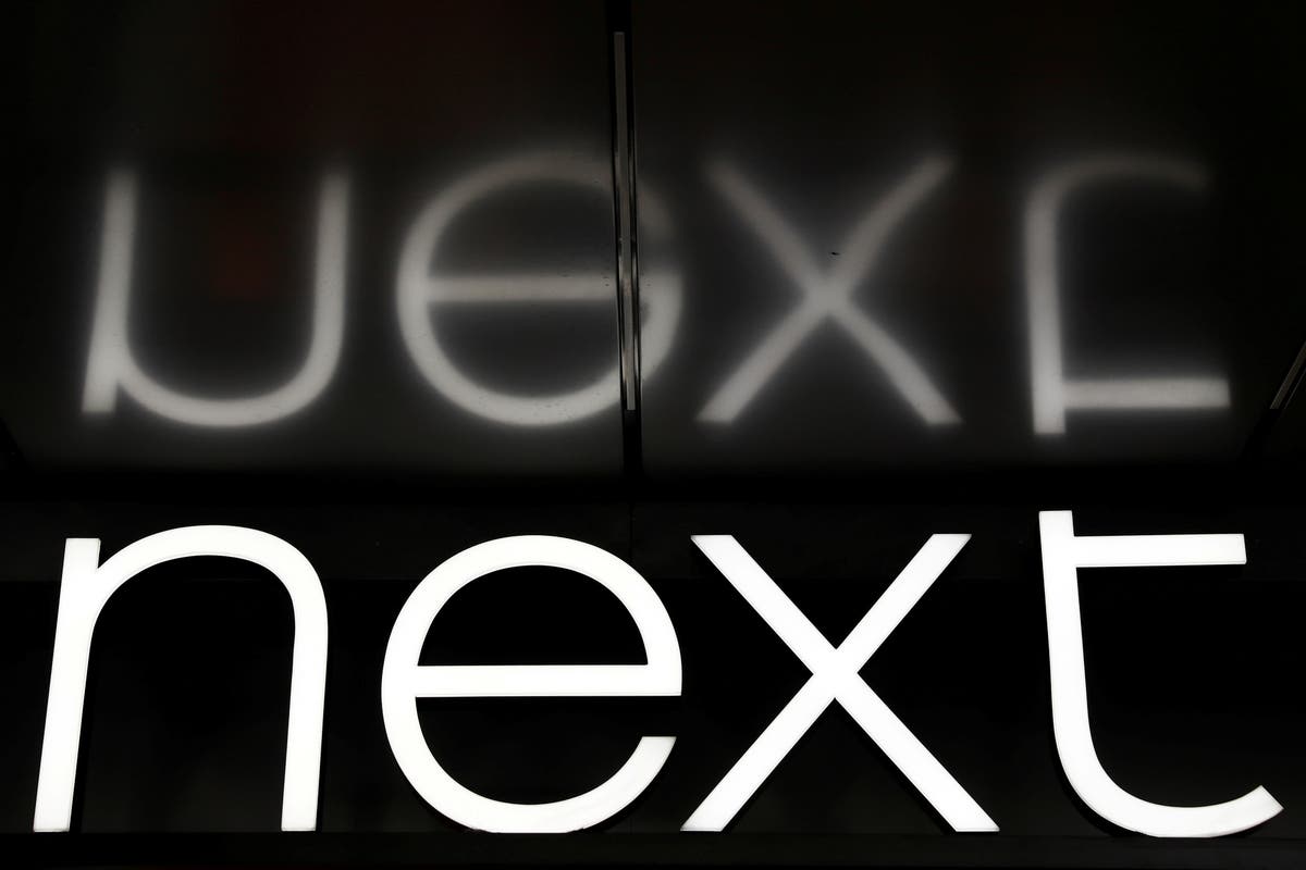 Next profits more than halved but online sales boom as stores forced to close 