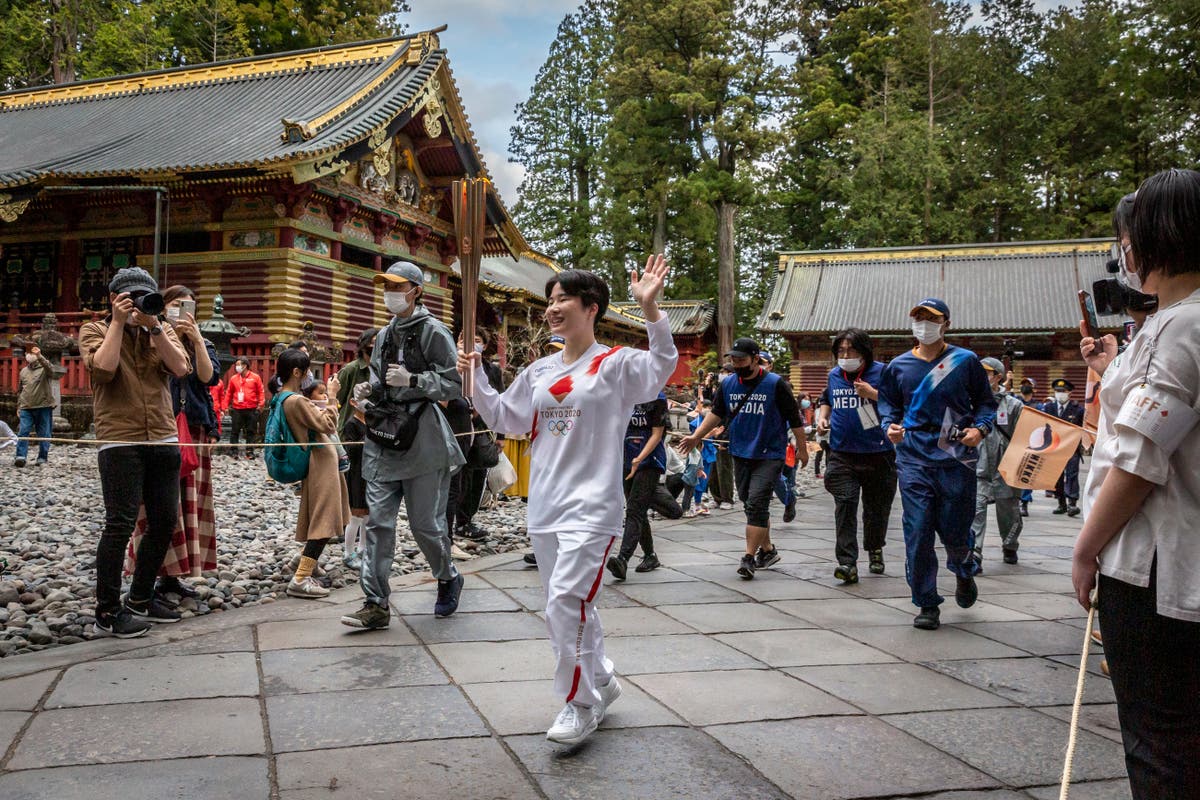 Olympic torch relay: Osaka governor urges cancellation over sharp rise in Covid cases