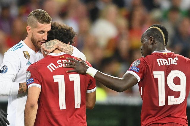 A challenge by Sergio Ramos (left) saw Mohamed Salah go off injured in the 2018 Champions League final