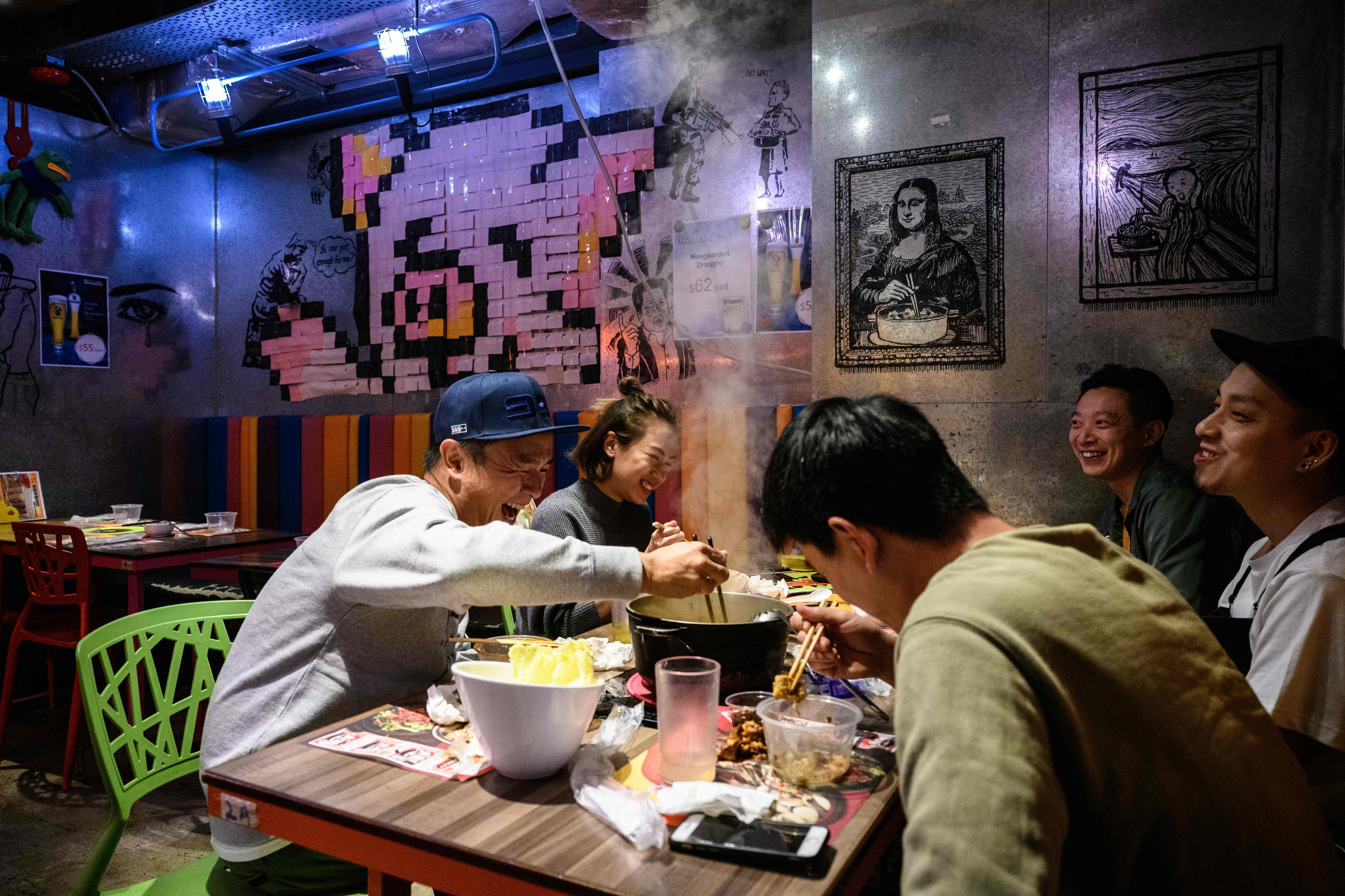 File: A hotpot concept restaurant in Hong Kong. A man threw soup at a Chinese woman at a hotpot restaurant on 29 March