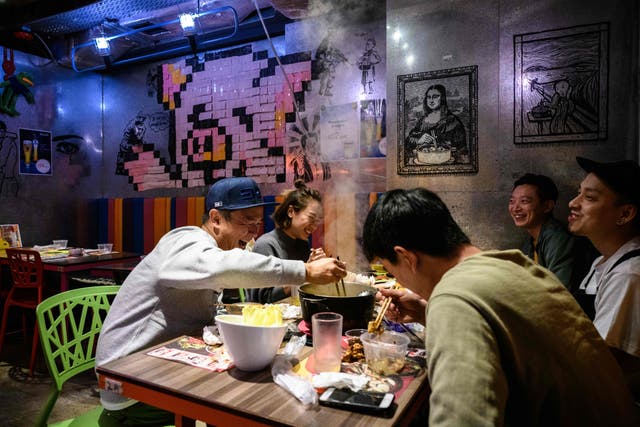 <p>File: A hotpot concept restaurant in Hong Kong. A man threw soup at a Chinese woman at a hotpot restaurant on 29 March </p>