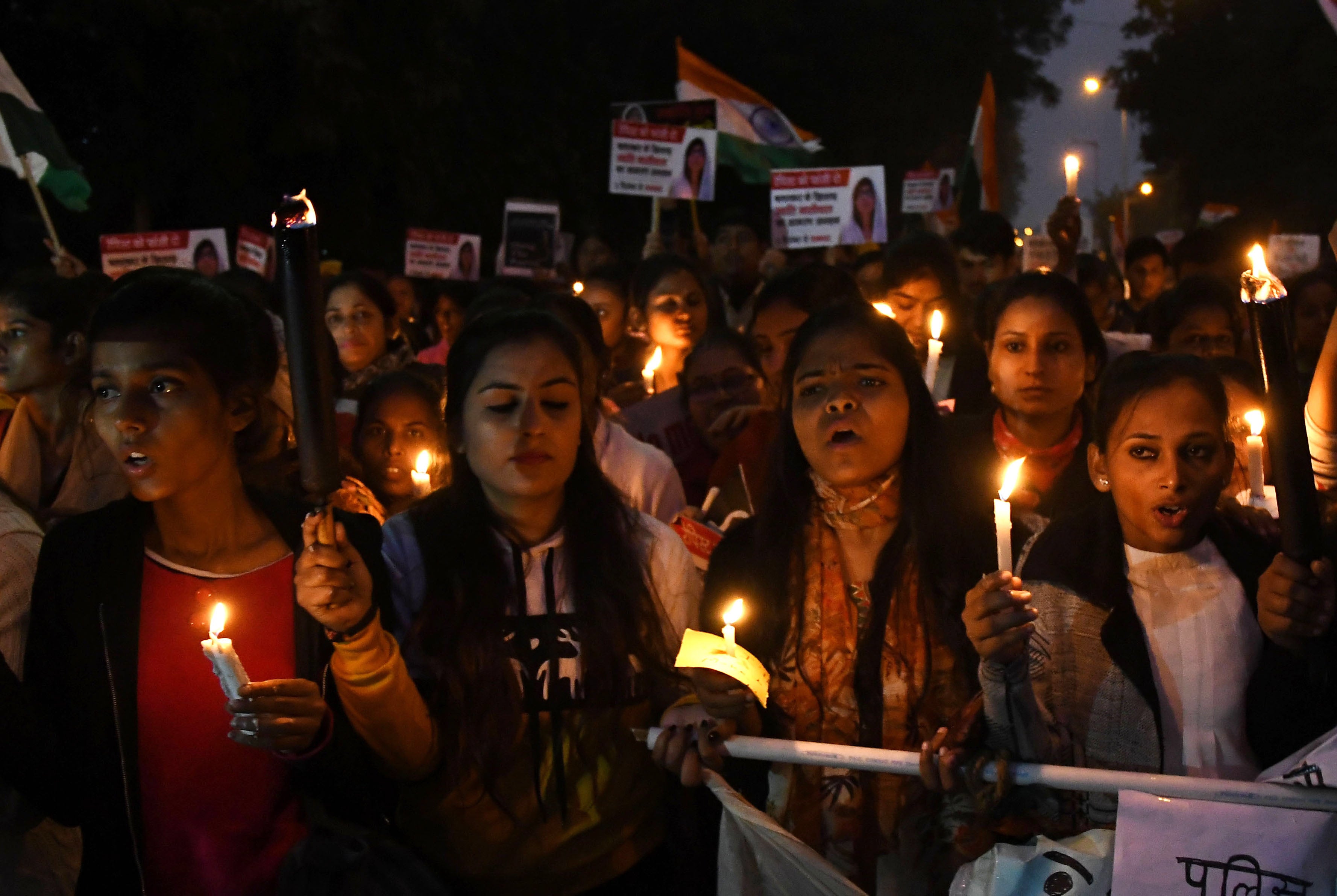 Indian women’s rights activists during a candle light march in Delhi in December 2019 to denounce violence against women