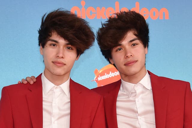 <p>US YouTubers twins Alan and Alex Stokes arrives for the 32nd Annual Nickelodeon Kids’ Choice Awards at the USC Galen Centre on 23 March 2019 in Los Angeles</p>