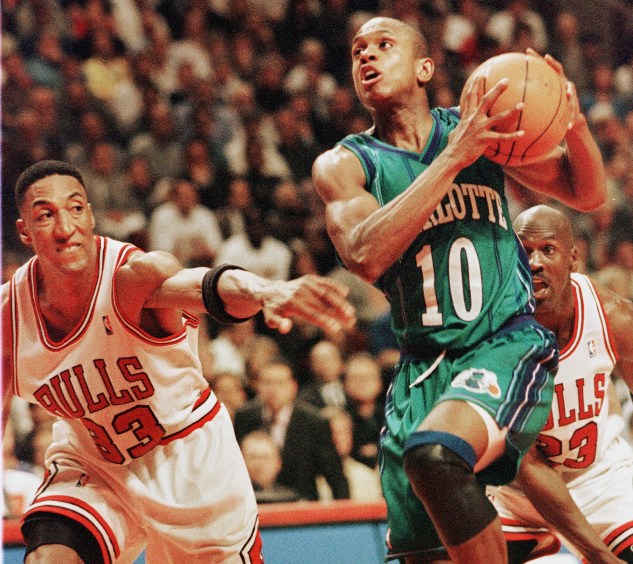 File: Scottie Pippen (L) and Michael Jordan(R) of the Chicago Bulls playing in an NBA Eastern Conference semifinals game at the United Center in Chicago in 1994