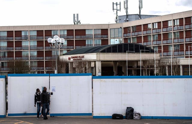 <p>Asylum seekers at the Crowne Plaza hotel in London</p>