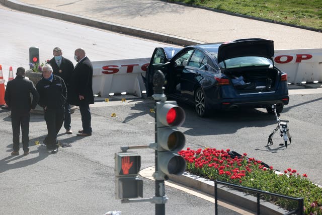 <p>Law enforcement investigate the scene after a vehicle charged a barricade at the U.S. Capitol on April 02, 2021 in Washington, DC.</p>