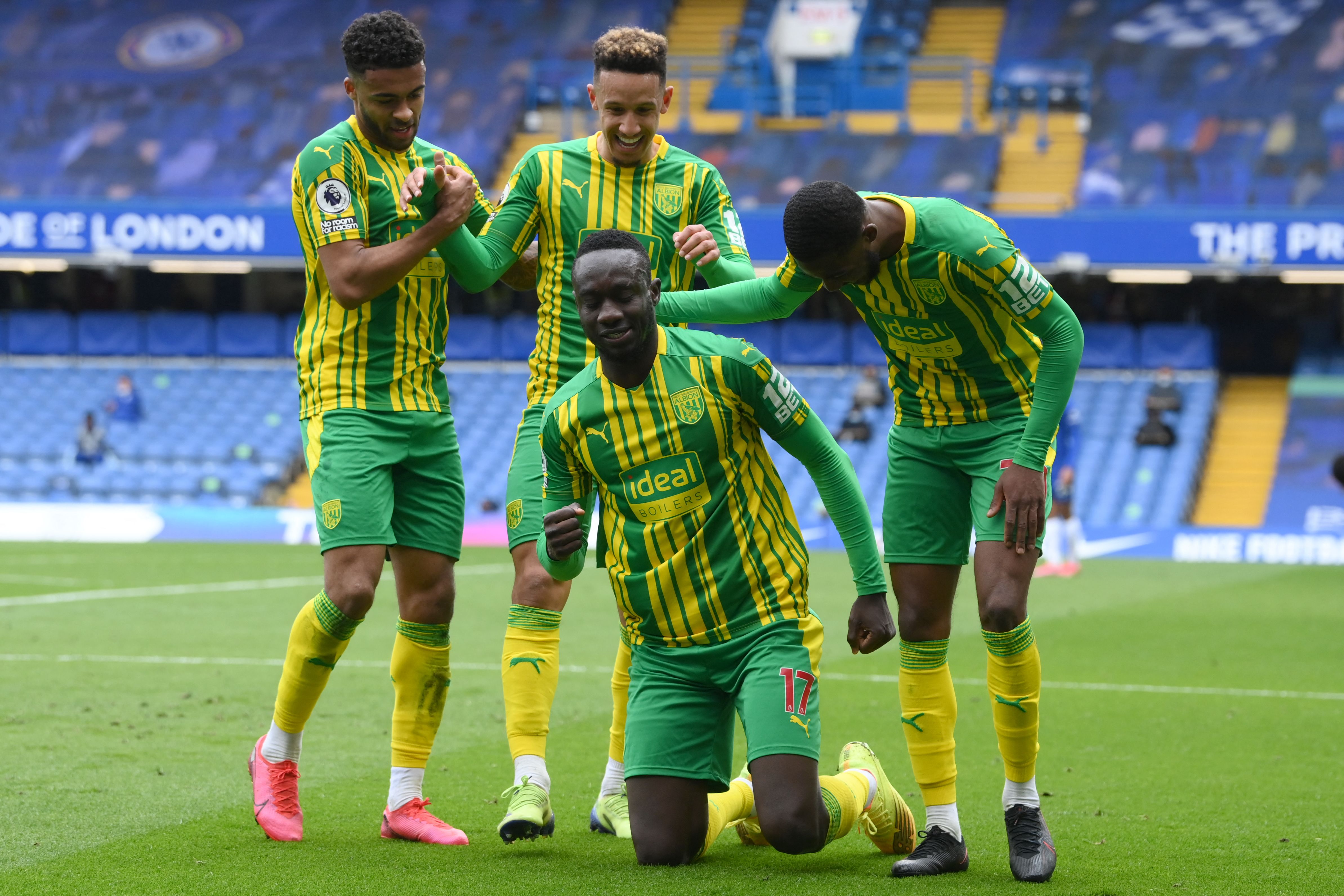 Mbaye Diagne celebrates with teammates after scoring his team’s fourth goal