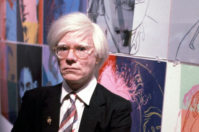 <p>The American artist and filmmaker Andy Warhol with his paintings(1928 - 1987), December 15, 1980</p>