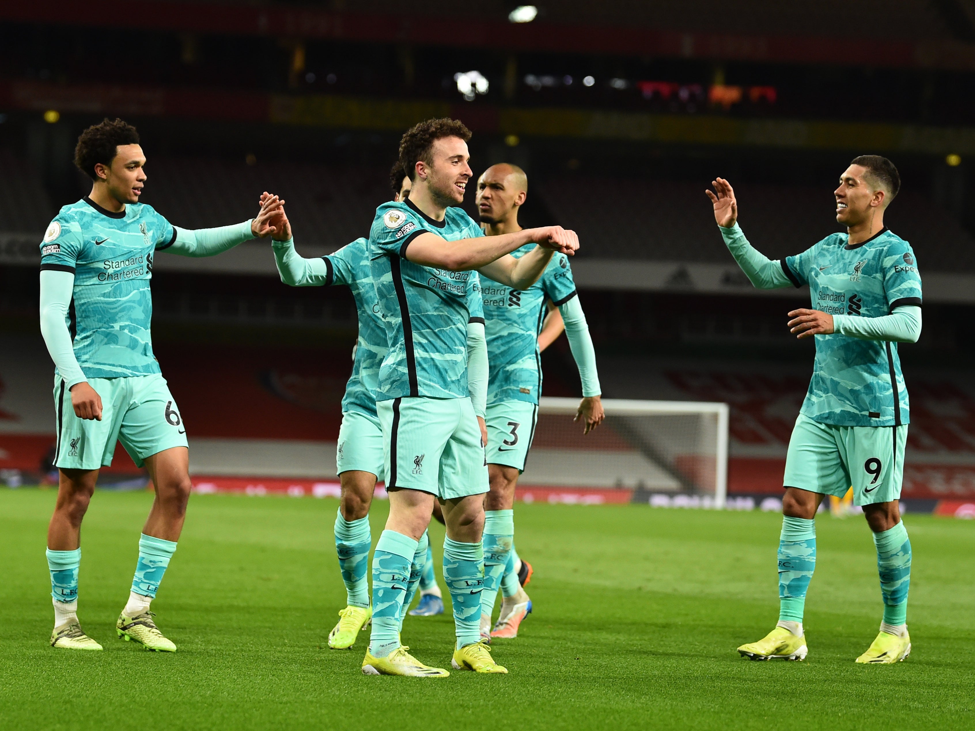 Diogo Jota of Liverpool celebrates after scoring the first goal