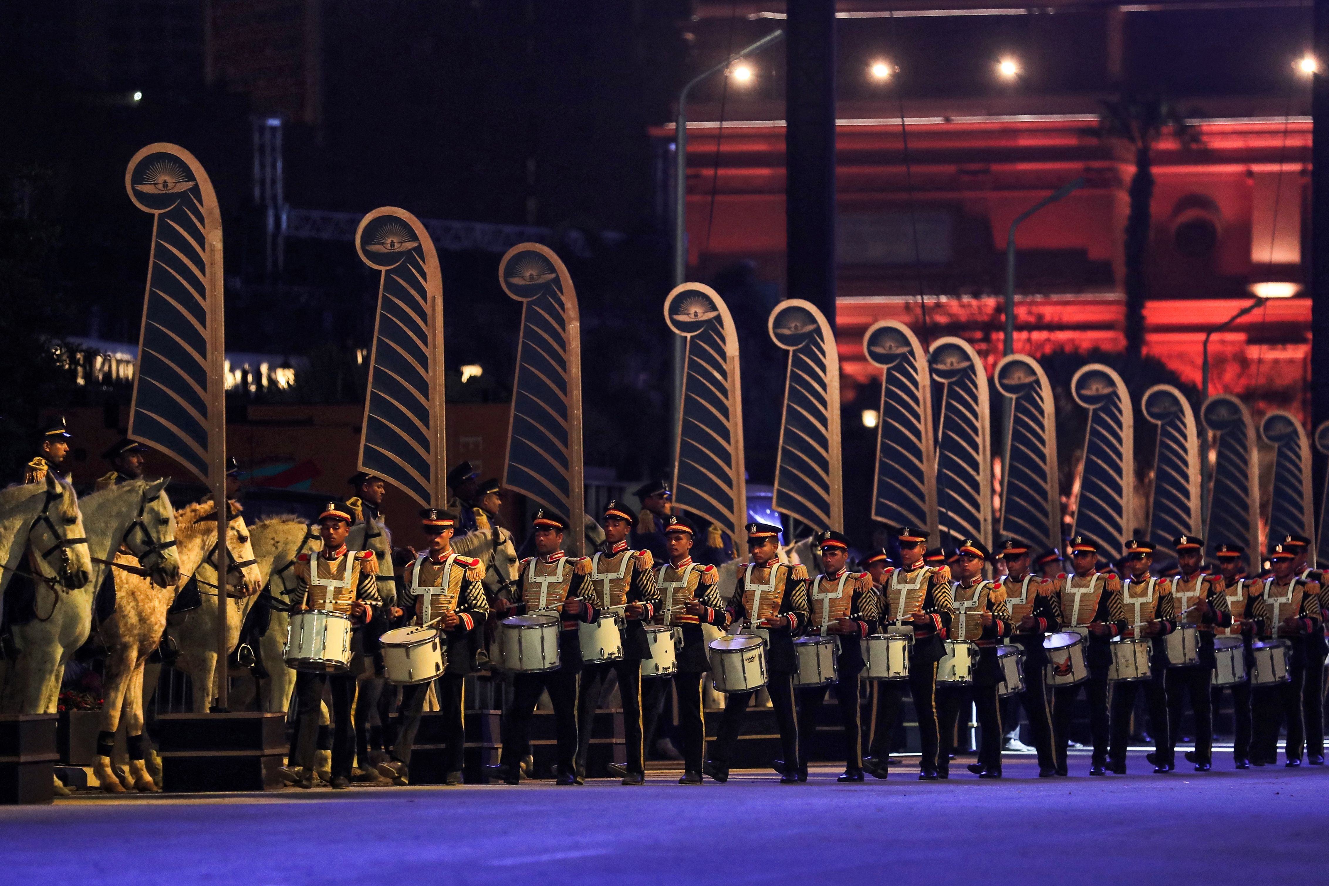 A marching band marches at the start of the parade of 22 ancient Egyptian royal mummies departing from the Egyptian Museum in Cairo’s Tahrir Square on Saturday, 3 April, 2021, on their way to their new resting place at the new National Museum of Egyptian Civilisation about seven kilometres south in historic Fustat.