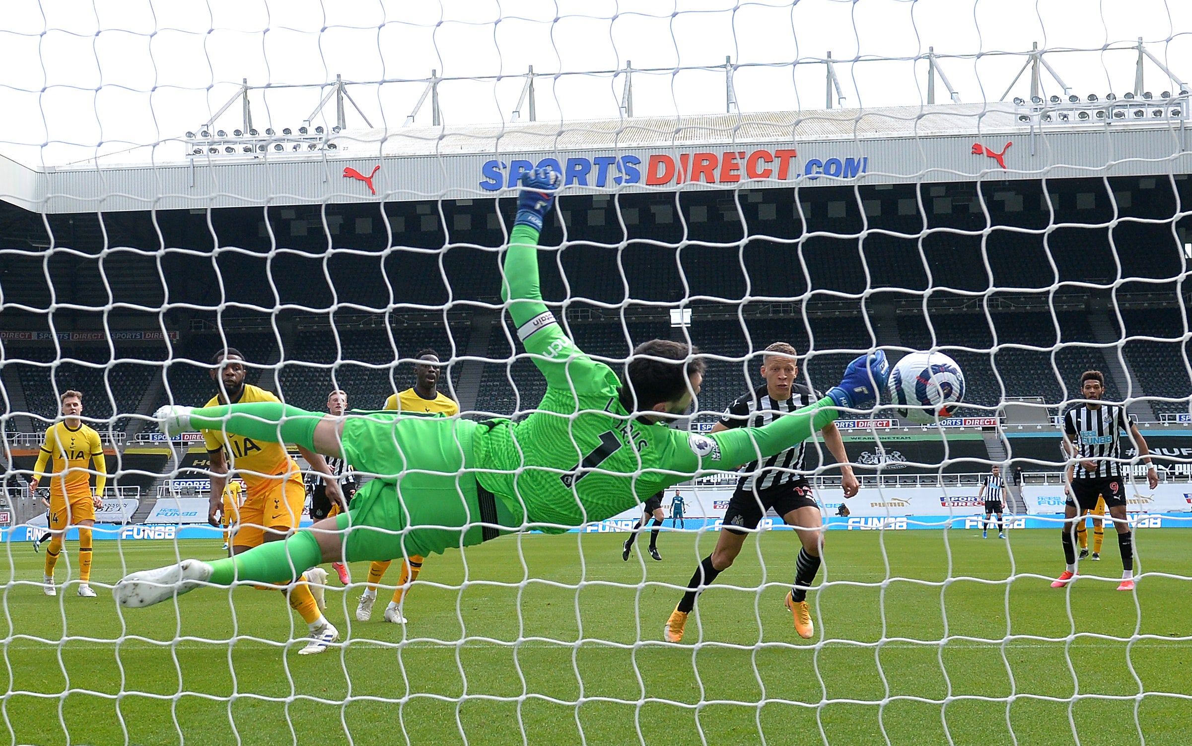 Tottenham goalkeeper Hugo Lloris produces a great save to deny Dwight Gayle