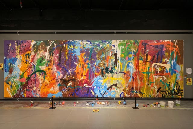 <p>The paint and brushes which were used in the live performance are regarded as integral parts of the artwork</p>