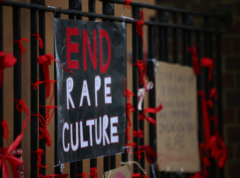 <p>A placard saying 'End Rape Culture' attached to the fence outside James Allen's Girls' School in London</p>