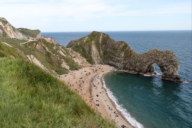 <p>Durdle Door, one of Dorset’s most famous tourist attractions, was the scene of several stunts last year</p>