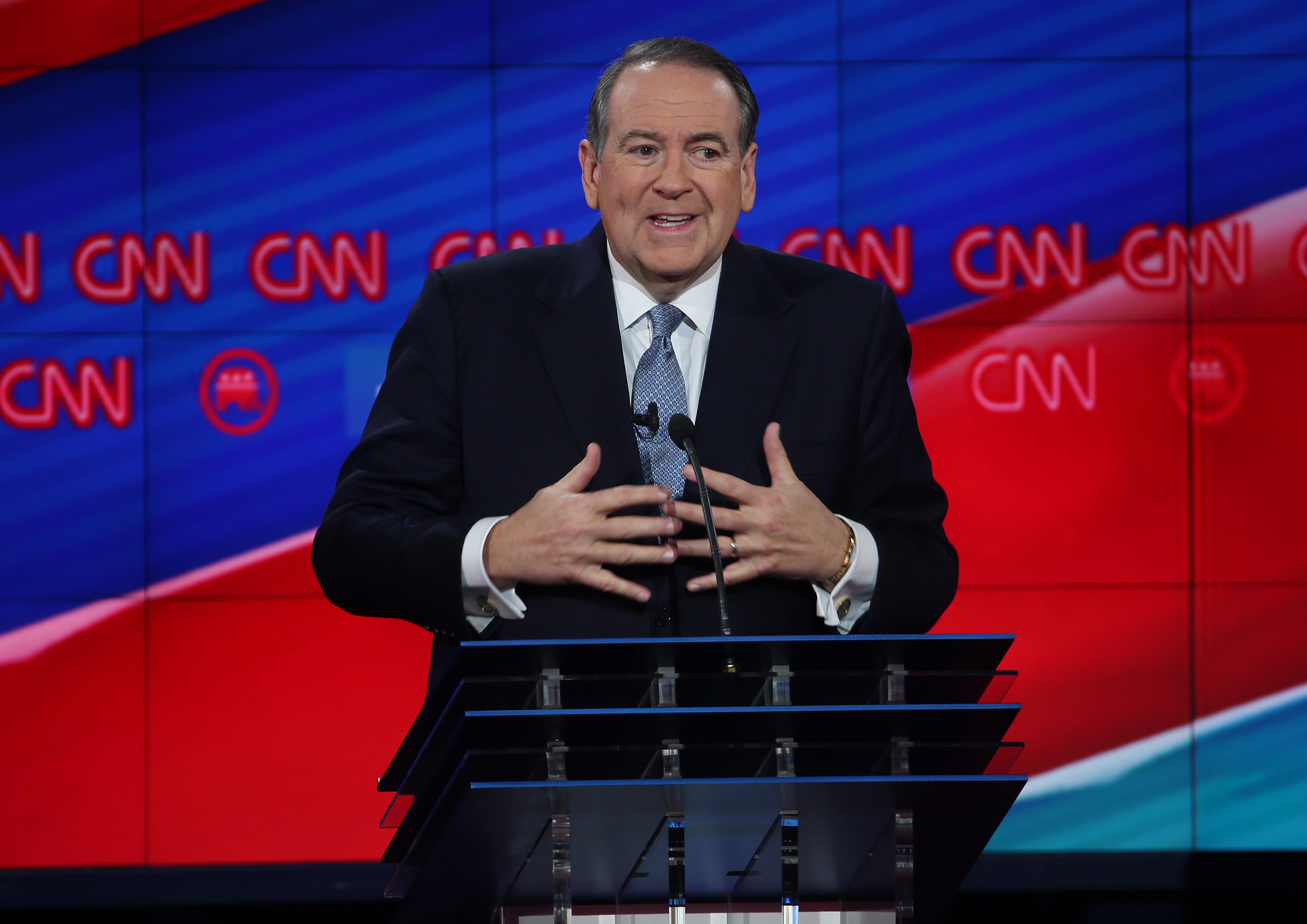 Mike Huckabee, pictured in 2015 during a debate for Republican presidential candidates, has received an online backlash for an ‘anti-Asian’ tweet