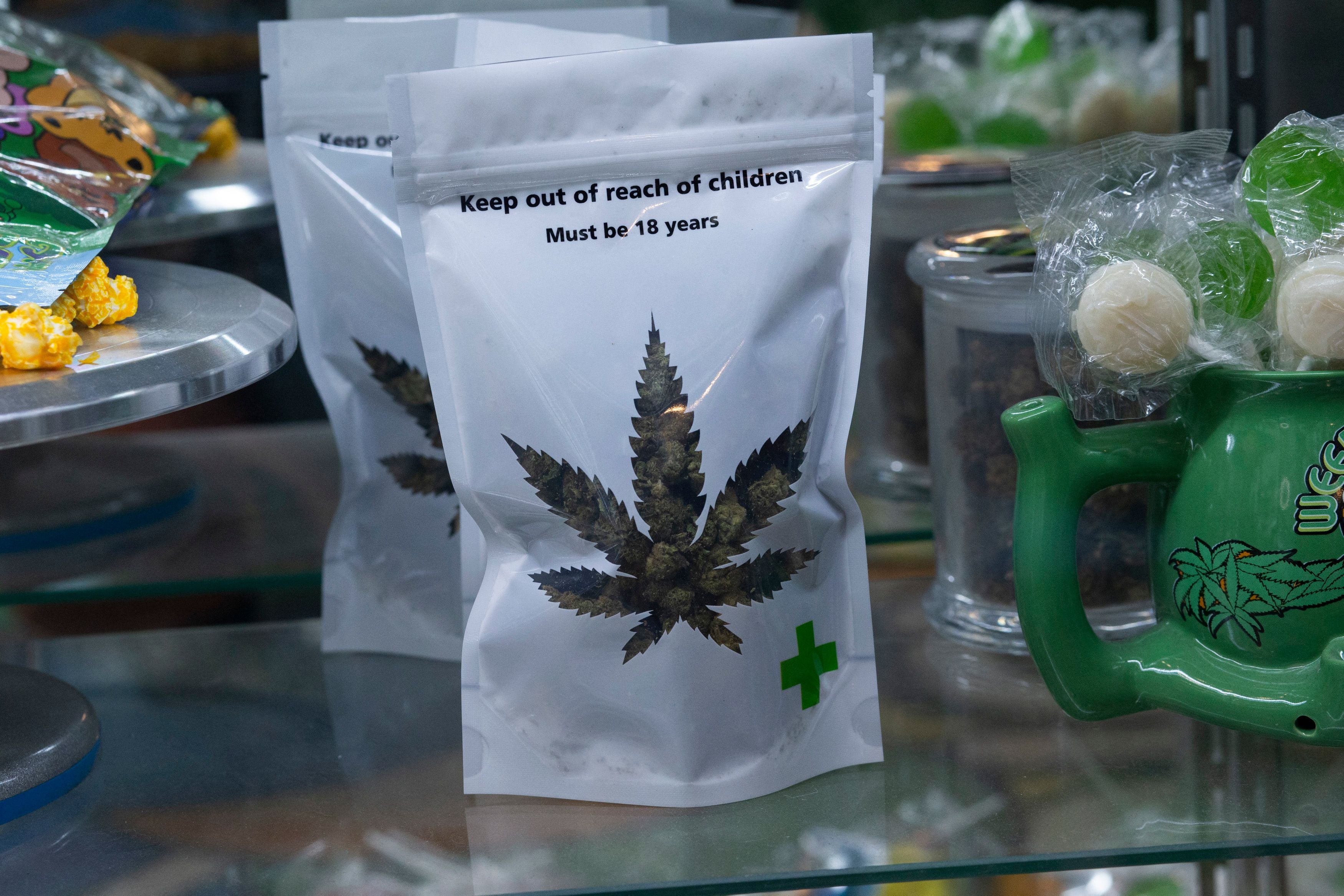 Experts analysed data from the United States that showed a “small but significant” increase in motor collisions and deaths (pictured: Marijuana products on display in shop in New York)
