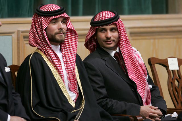 <p>Prince Hamzah Bin Al-Hussein (right) says his phone and internet services have been cut off</p>
