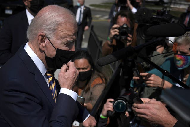 <p>US President Joe Biden answers questions while returning to the White House on April 05, 2021 in Washington, DC</p>