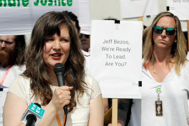 <p>File: Emily Cunningham, left, speaks during a news conference following Amazon's annual shareholders meeting, May 2019, in Seattle</p>
