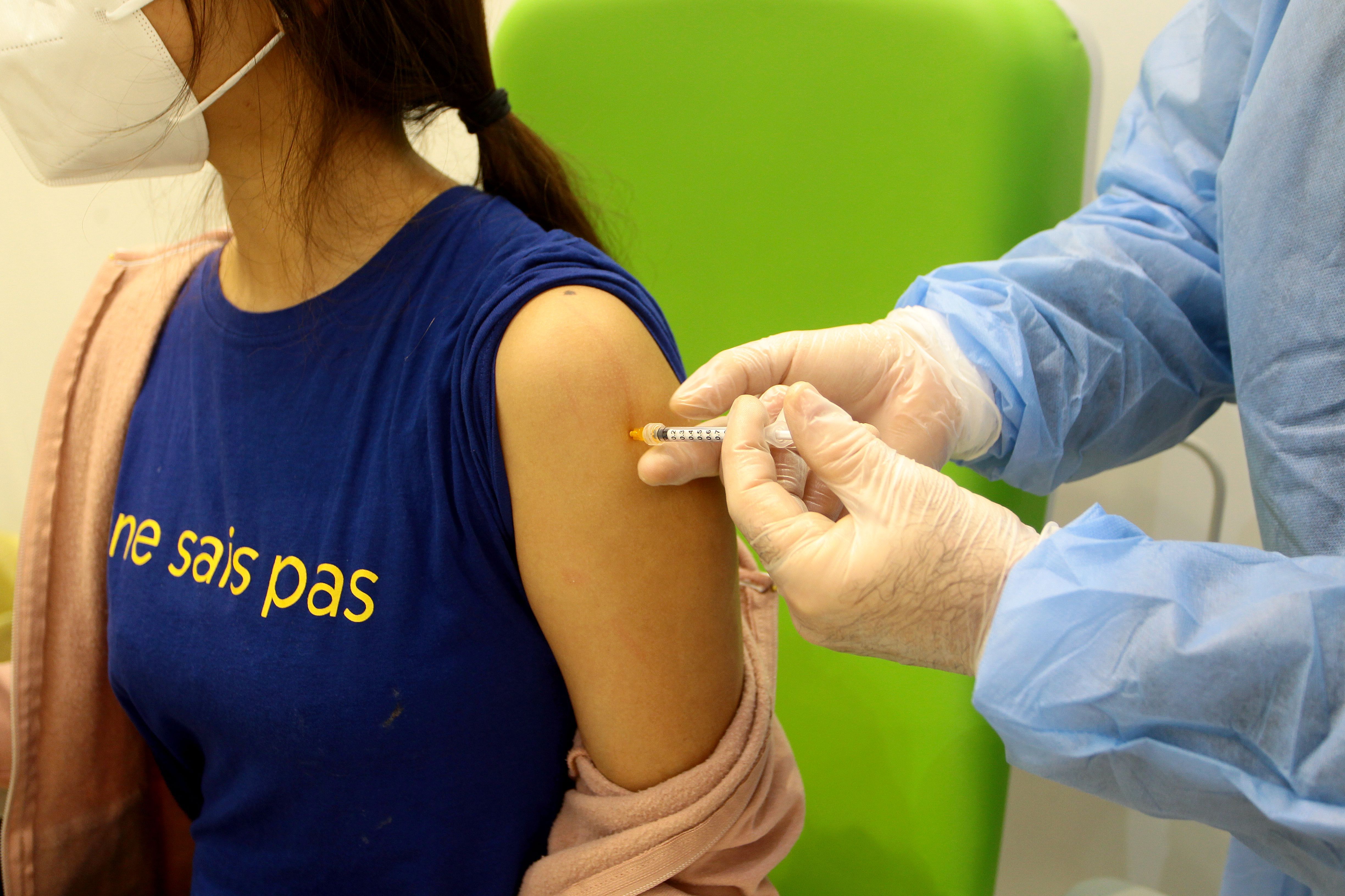 People receive the AstraZeneca vaccine in Italy