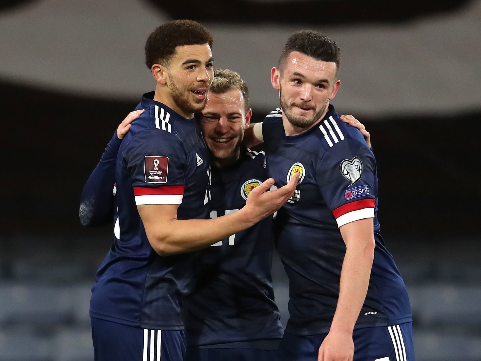 Scotland players celebrate scoring a goal