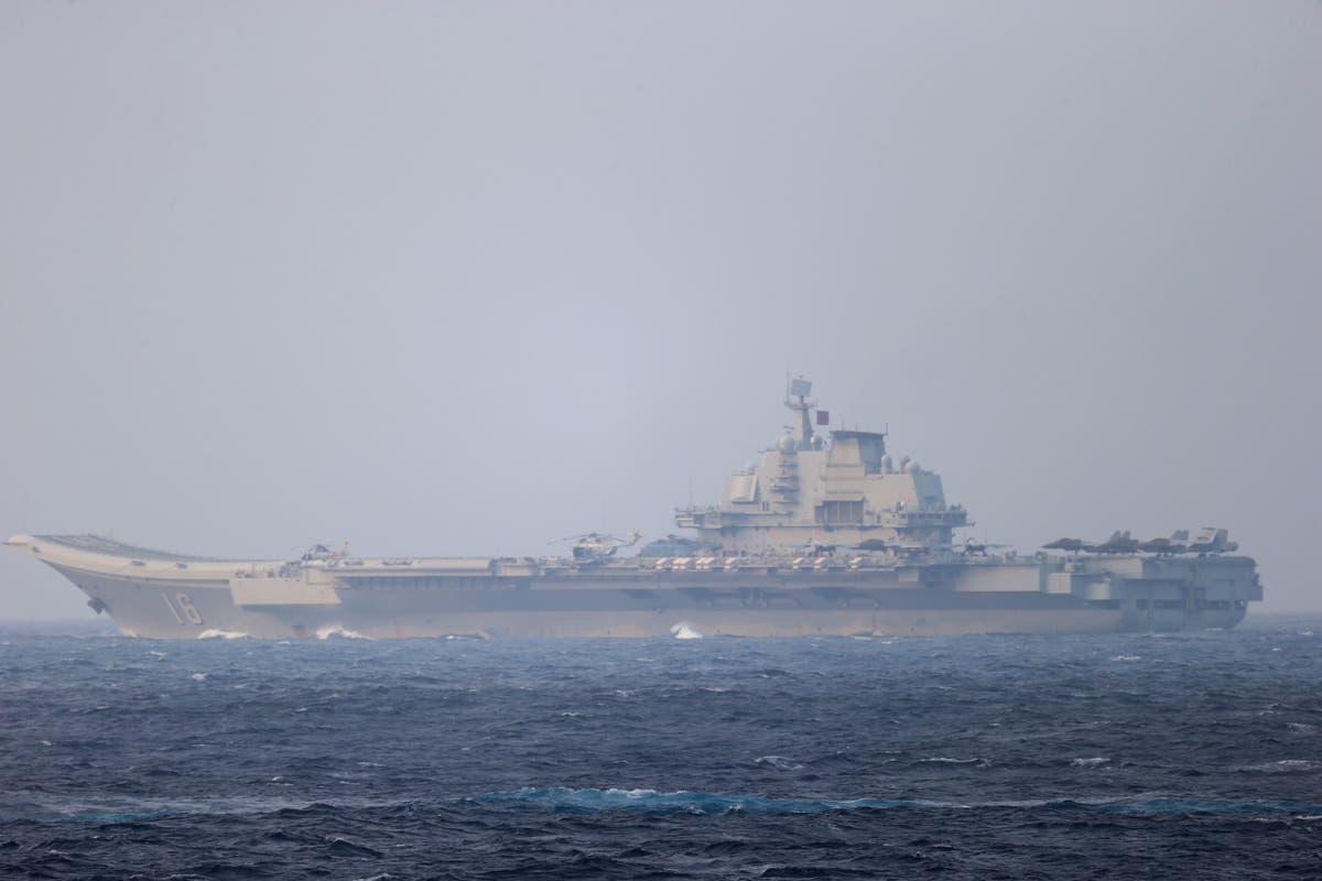 China moves aircraft carrier near Taiwan and threatens &lsquo;regular&rsquo; drills as tensions mount