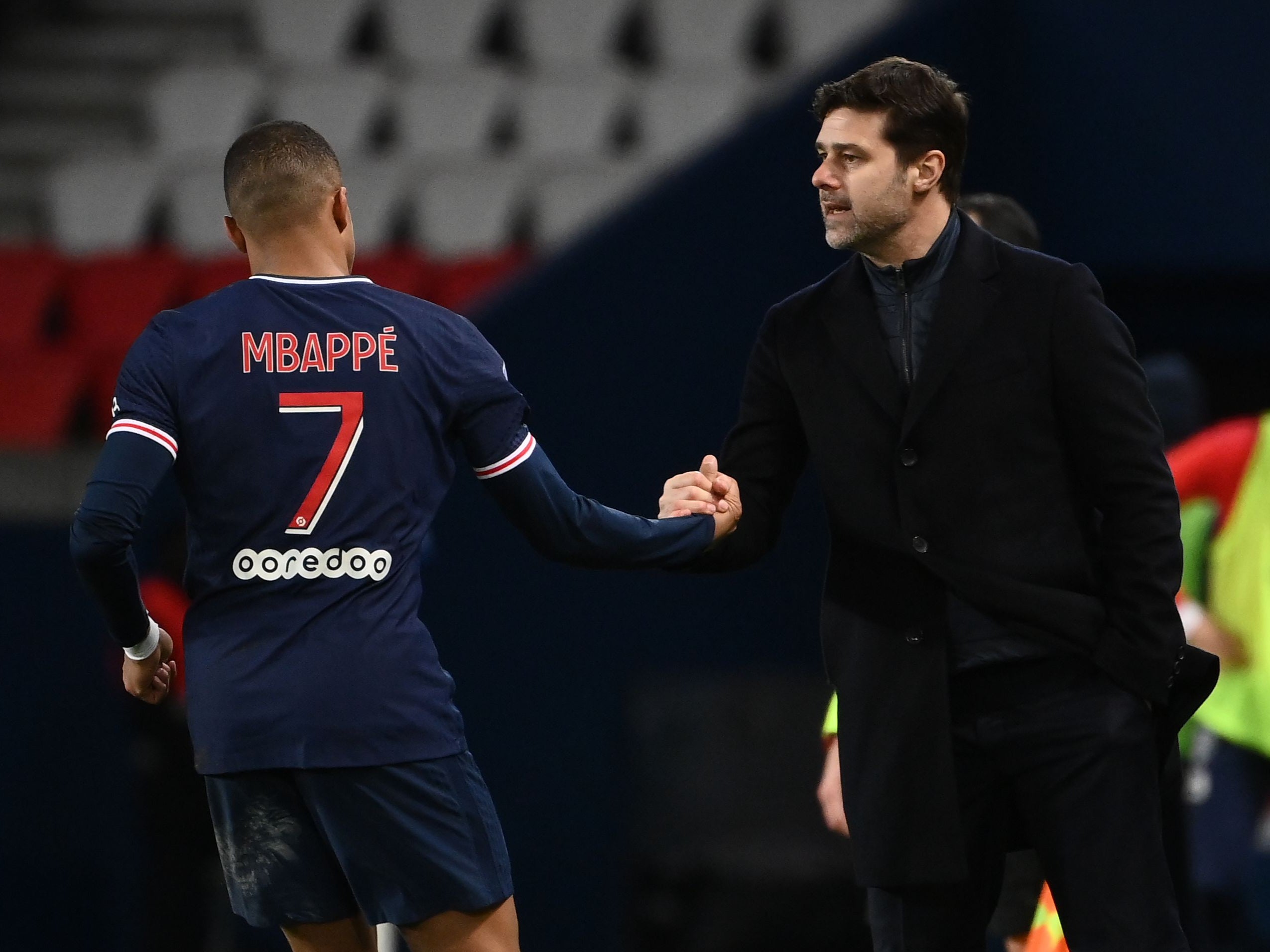 PSG head coach Mauricio Pochettino and Kylian Mbappe